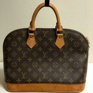 Authentic Louis Vuitton monogram alma satchel bag